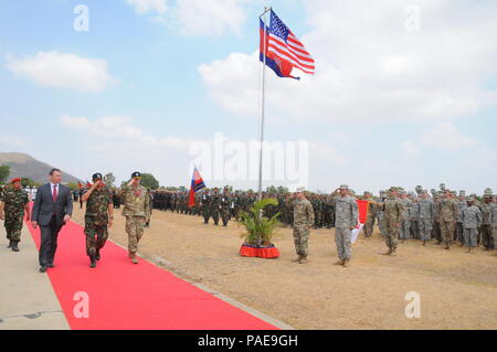 (left to right)Ambassador William Headt, the U.S. Ambassador to the Kingdom of Cambodian; Royal Cambodian Army Gen. Meas Sophea; and Maj. Gen. Todd McCaffrey, U.S. Army Pacific's Deputy Commander, troop the line to conclude the Angkor Sentinel 2016 closing ceremony March 25, 2016, at the Training School for Multinational Peacekeeping Forces in Kampong Speu Province, Cambodia. This year marked the seventh iteration of the annual bilateral military exercise hosted by the Royal Cambodian Armed Forces and sponsored by the U.S. Army Pacific that’s designed to collectively strengthen the two countri Stock Photo