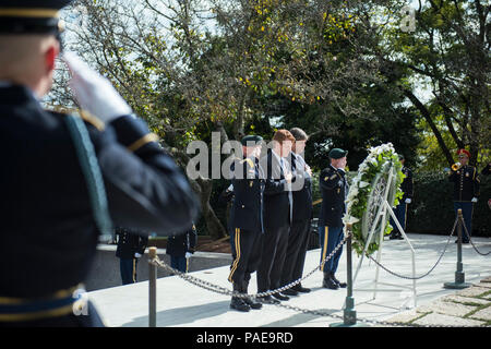 (From the left) U.S. Army Maj. Gen. Fran Beaudette, commanding general, 1st Special Forces Command (Airborne); Congressman Joe Kennedy III; Dr. William Kennedy Smith; and Command Sgt. Maj. Brian Rarey, 1st SFC (A) Command Sergeant Major; renders honors during the 1st Special Forces Command (Airborne) Wreath-Laying Ceremony at the gravesite of President John F. Kennedy at Arlington National Cemetery, Arlington, Virginia, Oct. 25, 2017.  Kennedy contributed greatly to the Special Forces, including authorizing the “Green Beret” as the official headgear for all U.S. Army Special Forces. Stock Photo