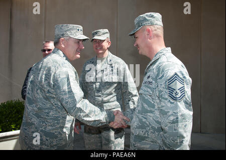 059: Maxwell AFB, Ala. - General Mark A. Welsh, III, twentieth Chief of Staff of the US Air Force, is welcomed to Maxwell Gunter Annex by Air Force Life Cycle Management Center personnel Colonel Michael Jiru, center, and Chief Master Sergeant Derrick Grames, Superintendent, Business & Enterprise Systems Directorate, March 22, 2016. Welsh met with First Sergeants from Maxwell-Gunter organizations. (US Air Force photo by Melanie Rodgers Cox/Released) Stock Photo