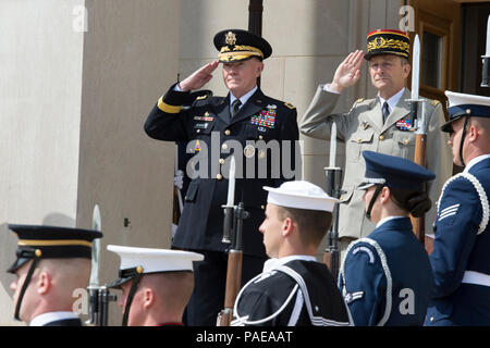 18th Chairman of the Joint Chiefs of Staff Army Gen. Martin E. Dempsey and French Chief of Defense Staff Gen. Pierre de Villiers salute in front of the Pentagon during an honor cordon in Arlington, Va., April 23, 2014. DoD Stock Photo