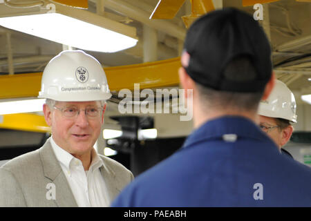 NEWPORT NEWS, Va. (Mar. 25, 2016) --  Rep. Mike Conway of Texas tours the machine shop aboard Pre-Commissioning Unit Gerald R. Ford (CVN 78) with Huntington Ingalls Newport News Shipbuilding employees during a visit to the ship. Ford is currently under construction at Huntington Ingalls Newport News Shipbuilding. (U.S. Navy photo by Mass Communication Specialist Seaman Cathrine Mae O. Campbell/Released) Stock Photo