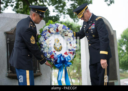 Chaplain (Maj. Gen.) Paul K. Hurley, chief of chaplains, U.S. Army Chaplain Corps, and Sgt. Maj. Ralph Martinez, regimental sergeant major, U.S. Army Chaplain Corps lay a wreath at Chaplain's Hill in honor of the 242nd U.S. Army Chaplain Corps Anniversary at Arlington National Cemetery, Arlington, Va., July 28, 2017.  Hurley and Martinez also laid a wreath at the Tomb of the Unknown Soldier. Stock Photo