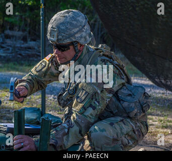 the soldier in the performance of tasks in camouflage and protective ...