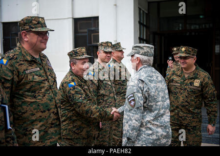 U.S. Army Brig. Gen. Giselle Wilz, NATO Headquarters Sarajevo commander, greets Armed Forces of Bosnia and Herzegovina soldiers during a visit to 5th Brigade at Dubrave Barracks, Bosnia and Herzegovina, March 30, 2016. Wilz visited to meet with brigade leadership and familiarize herself with the base and it's mission. (U.S. Air Force photo by Staff Sgt. Clayton Lenhardt/Released) Stock Photo