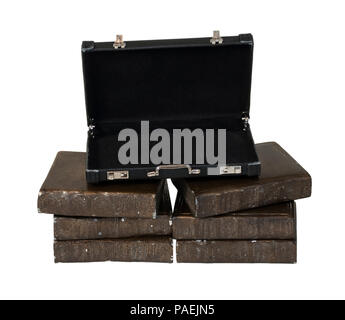 Briefcase on a stack of old books - path included Stock Photo