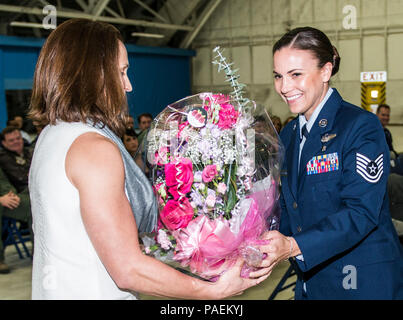 89th Airlift Wing Airmen attend the 99th Airlift Squadron change-of-command ceremony at Joint Base Andrews, Md., March 18, 2016. The 89th Operations Group consists of two flying squadrons, the 1st Airlift Squadron and the 99th Airlift Squadron, as well as the 89th OSS, an Operations Support Squadron.  The 89th Operations Group operates some of the most advanced commercial-based aircraft in the world, including the C-20B, C-37A, C-37B, C-32A and C-40B. The 89th AW maintains and operates 'Air Force One' and 14 other special air mission platforms. (U.S. Air Force photo by Senior Master Sgt. Kevin Stock Photo