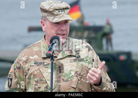 an engineer capabilities day in Chelmno, Poland. Engineers from the British and German armies assemble a bridge using the M3 Amphibious Rig to span the entire width of the Vistula River. The event showcases the interoperability of multiple armies during Exercise Anakonda 2016, a Polish-led, multinational exercise taking place in Poland from June 7-17. Exercise Anakonda 2016 is a premier training event for U.S. Army Europe and participating nations and demonstrates the U.S. and partner nations can effectively unite together under a unified command while training with a contemporary scenario. Stock Photo