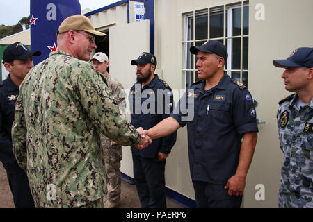 180717-N-LR347-012 NAVAL BASE POINT LOMA, Calif. (July 17, 2018) - U.S. Navy Rear Adm. Dave Welch, left, commander, Task Force (CTF) 177, Naval Surface and Mine Warfighting Development Center (SMWDC) shakes hands with a Royal New Zealand Navy sailor assigned to a subordinate unit of CTF 177 during a visit to Naval Base Point Loma. As CTF 177, Welch is the Mine Warfare Commander for Rim of the Pacific (RIMPAC) exercise, July 17. Twenty-five nations, 46 ships, five submarines, about 200 aircraft and 25,000 personnel are participating in RIMPAC from June 27 to Aug. 2 in and around the Hawaiian Is