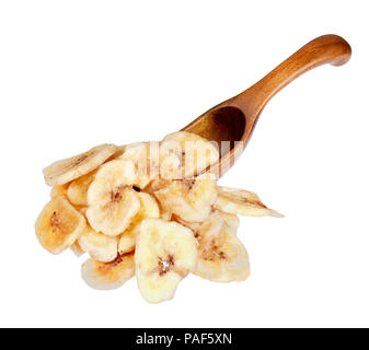 Banana chips in the wooden spoon, isolated on white background. Stock Photo