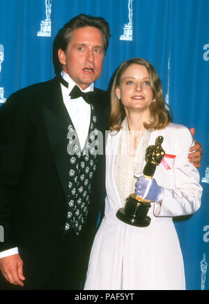 LOS ANGELES, CA - MARCH 30: Actor Michael Douglas and actress Jodie Foster attend the 64th Annual Academy Awards on March 30, 1992 at the Dorothy Chandler Pavilion in Los Angeles, California. Photo by Barry King/Alamy Stock Photo Stock Photo