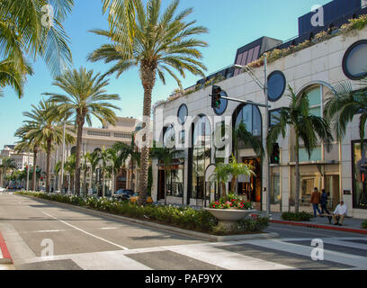 Wide angle view of designer shops and palm trees on Rodeo Drive, Beverly Hills, Los Angeles Stock Photo
