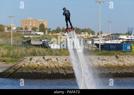 Vila do Conde, Portugal - May 16, 2015: Flyboard training and demonstration in the mouth of the Ave river Stock Photo