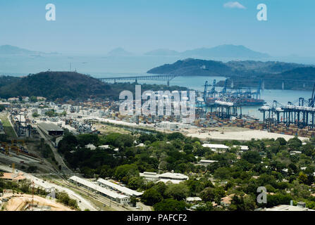 Aerial View Of Panama Industrial Port On The Atlantic Side. Large Harbor Cranes At The Commercial Dock In Panama City Stock Photo