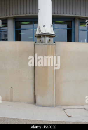 Stainless steel wind turbine mounting on concrete base at Cleveleys lancashire uk Stock Photo