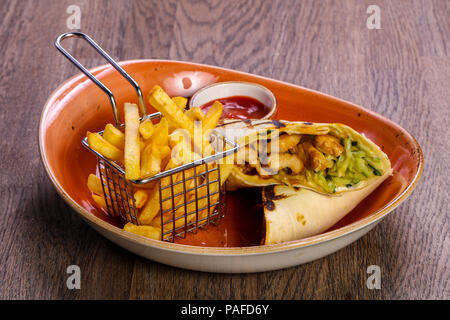 Pork Burrito with French potato Stock Photo