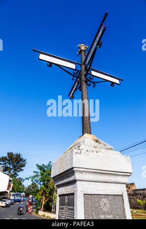 Old fashioned signpost and plaque commemorating Galle Heritage Trust at the Main Gate entrance to Galle Fort, Galle, Southern Province, Sri Lanka Stock Photo