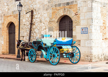 Retro carriage with a horse on a city street in Santo Domingo, Dominican Republic. Copy space for text Stock Photo