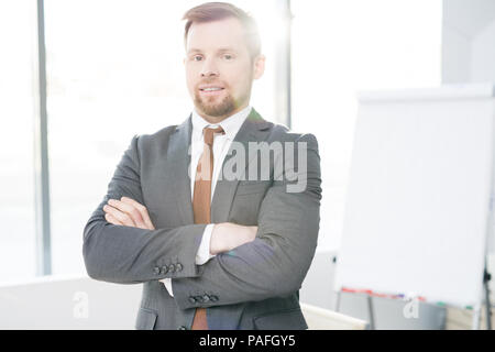 Confident Entrepreneur Posing in Office Stock Photo