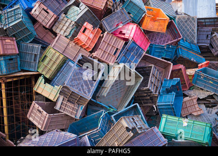 PUTTAPARTHI, ANDHRA PRADESH - INDIA - NOVEMBER 09, 2016: Many colored plastic boxes for collecting fruits and vegetables Stock Photo