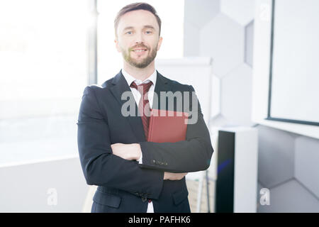 Successful Businessman Posing in Office Stock Photo