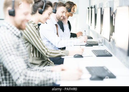 Customer Support Operators in Row Stock Photo