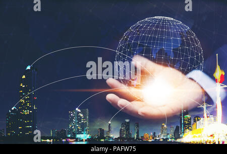 A man hand holding the digital global network technology digital network virtual screen,Future innovation concept. Stock Photo