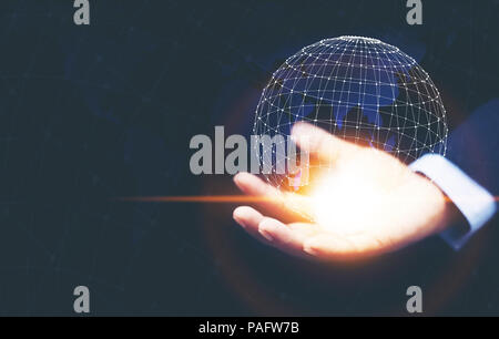 A man hand holding the digital global network technology digital network virtual screen,Future innovation concept. Stock Photo