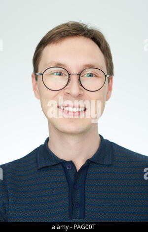 Portrait of young caucasian man in glasses isolated on white background Stock Photo