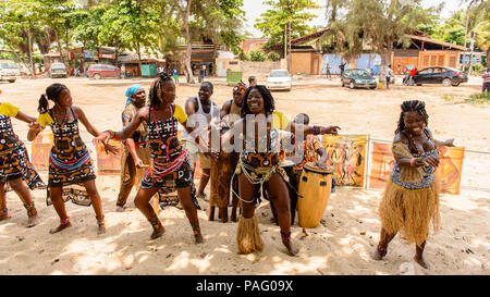 ANGOLA, LUANDA - MARCH 4, 2013:  Unidentified Angolan women make the street performance of the national falk dance for the tourists in Angola, Mar 4,  Stock Photo