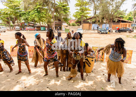 ANGOLA, LUANDA - MARCH 4, 2013:  Unidentified Angolan women make the street performance of the national falk dance for the tourists in Angola, Mar 4,  Stock Photo