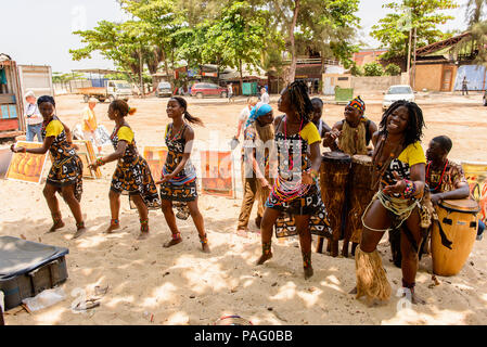 ANGOLA, LUANDA - MARCH 4, 2013:  Unidentified Angolan women make the street performance of the national falk dance for the tourists in Angola, Mar 4,  Stock Photo