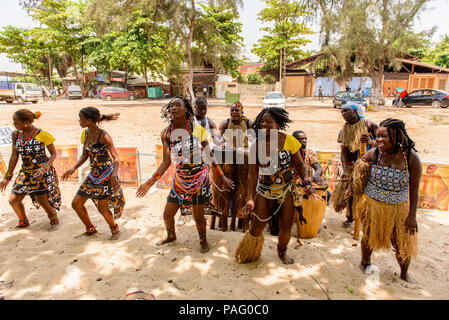 ANGOLA, LUANDA - MARCH 4, 2013:  Unidentified Angolan women make the street performance of the national falk dance for the tourists in Angola, Mar 4,  Stock Photo