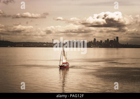 Sailing on the Puget Sound with the Seattle skyline in the background, Washington state, USA. Vintage look. Stock Photo