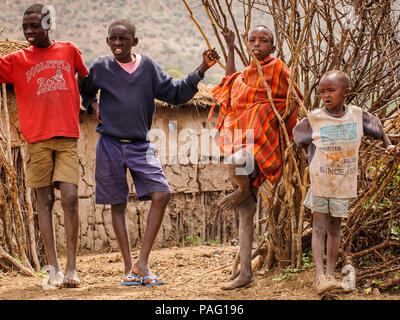 AMBOSELI, KENYA - OCTOBER 10, 2009: Unidentified Massai people in Kenya, Oct 10, 2009. Massai people are a Nilotic ethnic group Stock Photo