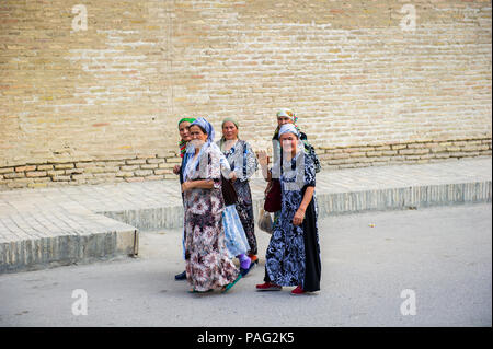 BUKHARA, UZBEKISTAN - JUNE 6, 2011: Unidentified Uzbek women came to see Samarquand in Uzbekistan, Jun 6, 2011.  81% of people in Uzbekistan belong to Stock Photo