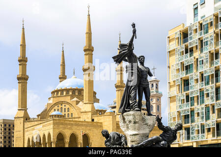 Modern buildings in Martyrs' square in Beirut Central District, Downtown, with Mohammad Al-Amin Mosque and Saint Georges Maronite Cathedral, Lebanon Stock Photo