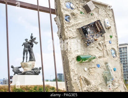 Martyrs' monument and art installation of concrete wall filled with junk in Martyrs' square, Beirut Central District, downtown, Lebanon Stock Photo