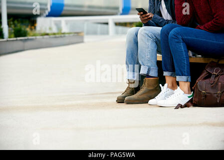 Students using smart phone Stock Photo
