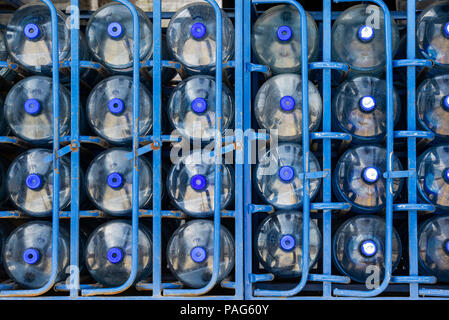 Rows of water bottles arranged in warehouse Stock Photo