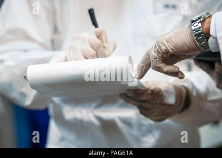 Scientists working in laboratory Stock Photo