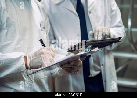 Scientists working in laboratory Stock Photo