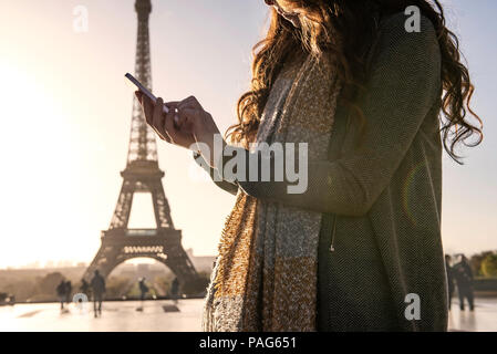 Woman using smart phone Stock Photo