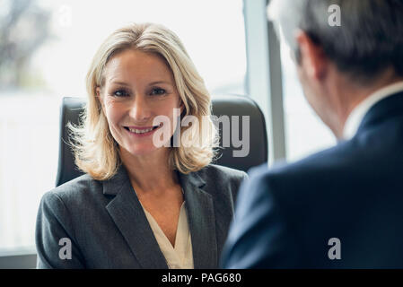 Close-up of businesswoman smiling Stock Photo