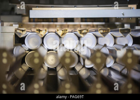 Manufacturing plastic cups in factory Stock Photo
