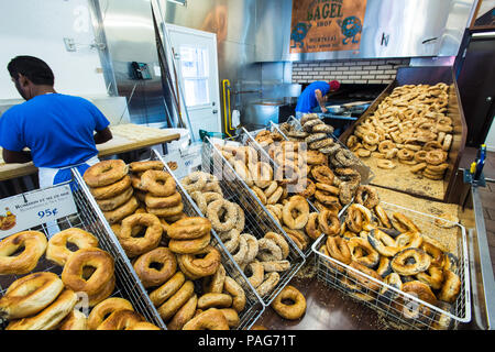 Bagel being prepared and baked at St-Viateur Bagel shop in Montreal Stock Photo