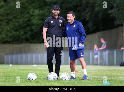 Crawley Town's head coach Harry Kewell talks with Ipswich Manager Paul Hurst during the pre season friendly between Crawley Town and Ipswich Town at East Court, East Grinstead, UK. 17 July 2018. Stock Photo