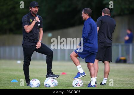 Crawley Town's head coach Harry Kewell talks with Ipswich Manager Paul Hurst during the pre season friendly between Crawley Town and Ipswich Town at East Court, East Grinstead, UK. 17 July 2018. Stock Photo