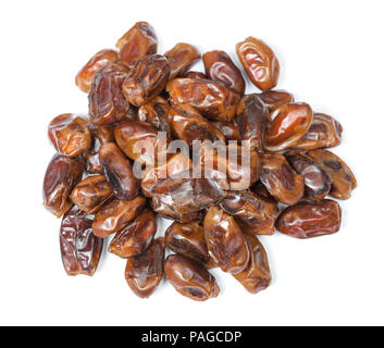 Heap of dried pitted dates isolated on white background