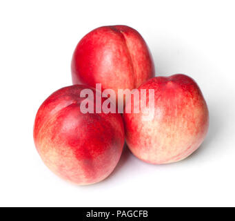 Few tasty nectarines isolated on white background Stock Photo