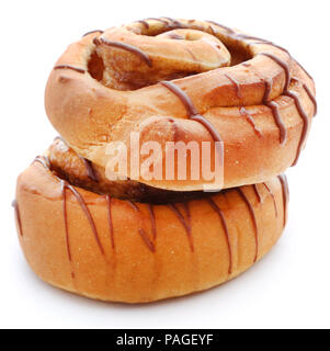 Close up of a cinnamon bun isolated against white background Stock Photo